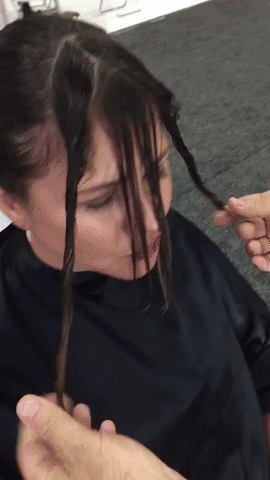 sectioning hair to cut bangs with a razor