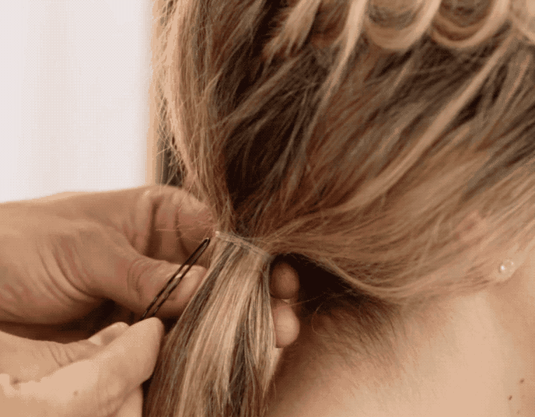 Watch + Create This Cool Elevated 3-Strand Braid + Low Ponytail