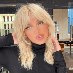 medium length wolf cut on blonde hair