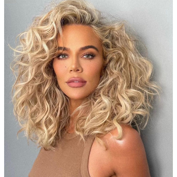 2022 hair styling trends to know khloe kardashian 80s spiral perm curls