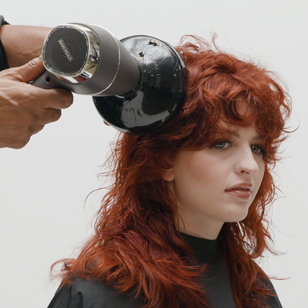 Learn how to cut a 70s inspired shag haircut. Get the full cutting how-to from Sam Villa!
