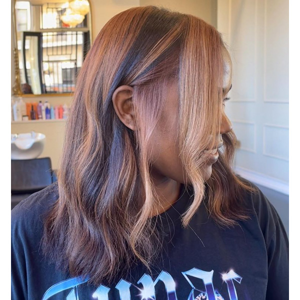 biggest hair color trends spring summer 2022 copper brunette highlights textured hair