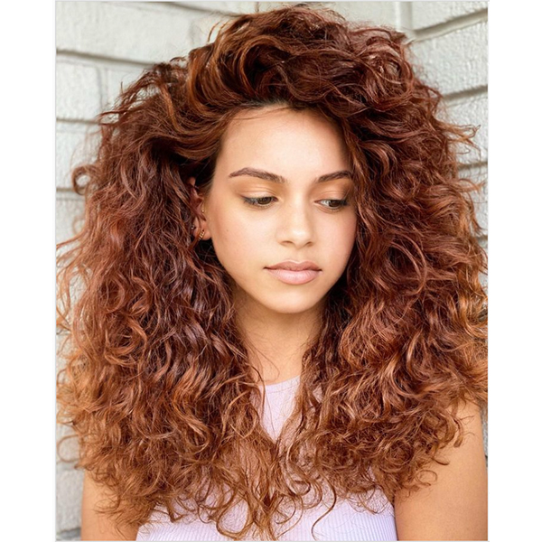 winter haircut trends 2022 2023 big curly hair layers contour cut