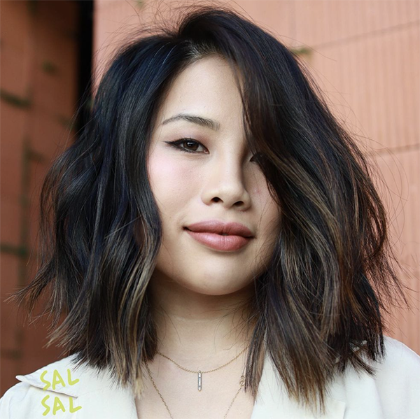 What Is the Layered Curve Haircut, Plus How to Style It