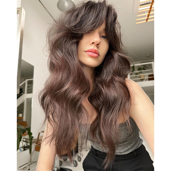summer spring biggest haircut salon trends 2023 how to midlength layers long bangs wavy shag fringe