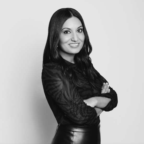 A black and white headshot of Nilofer Vahora, amika's new Chief Marketing Officer