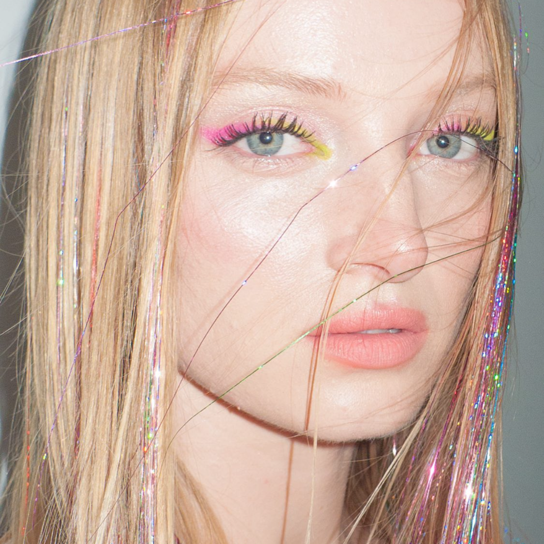 long blonde hair with pink tinsel