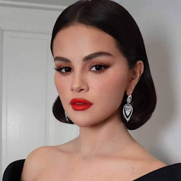 Selena Gomez’s red carpet look at the 2025 SAG Awards, featuring a vintage-inspired, modern sleek bob with soft volume and a chic tuck.