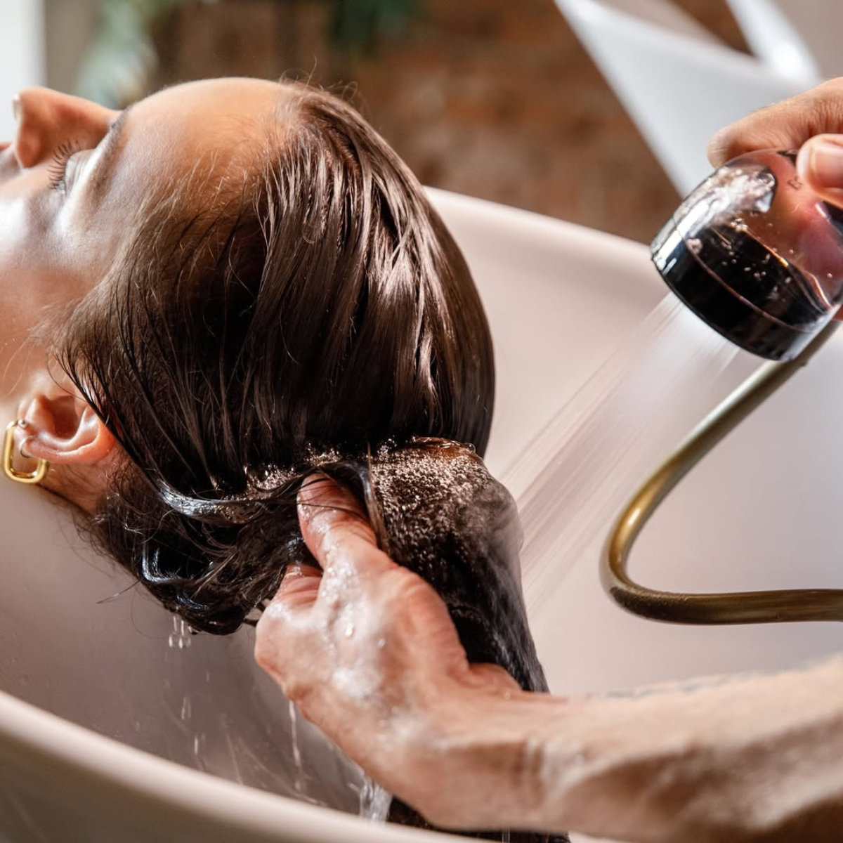 Hard Water Ruining Your Hair Color? Here's How To Fix It