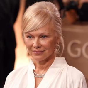 Pamela Anderson's Platinum Blonde French Twist at the 2026 Golden Globes-img