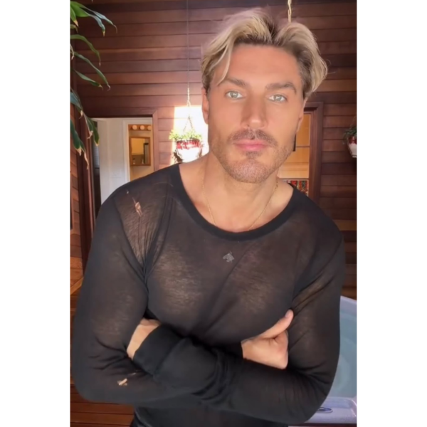 chris appleton with his new bright blonde hair posing front view