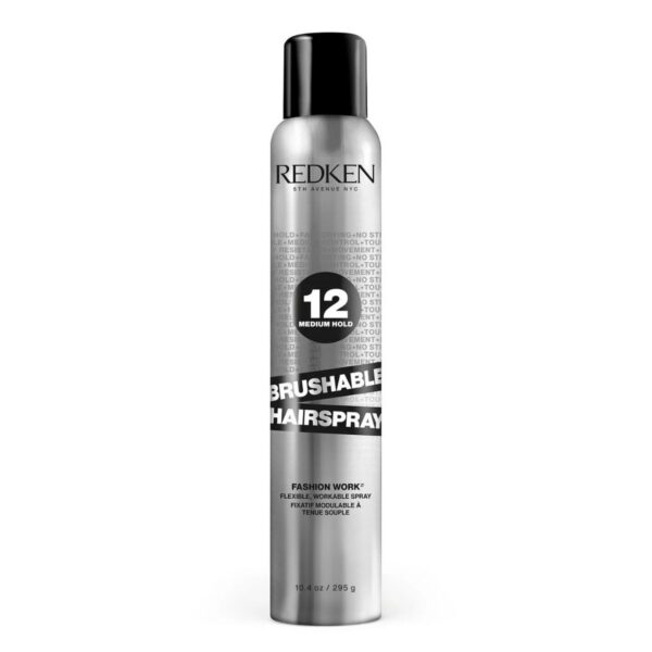 Redken Brushable Hairspray in a silver aerosol can with black cap, labeled ‘12 Medium Hold,’ designed for flexible, brushable hold and natural movement
