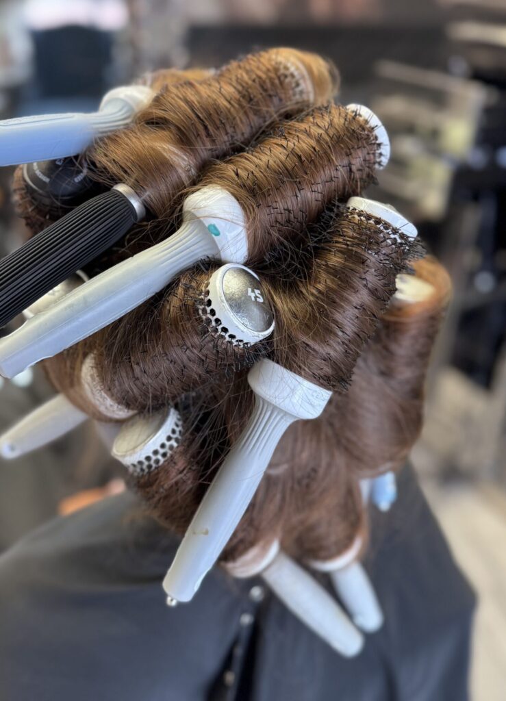 how to use volume spray for a voluminous blowout