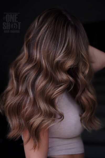 Brunettes finalist entry by hairstylist @_watchmepaint for the 2024 #ONESHOT Hair Awards Hot Shot